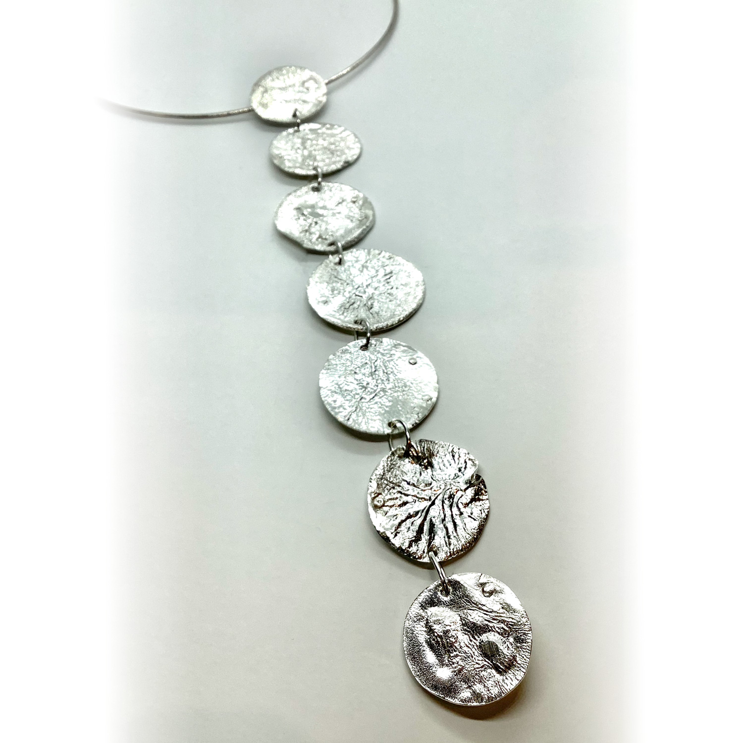 Alice Portnoy Reticulated hanging circlers 